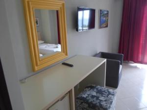 TV a/nebo společenská místnost v ubytování Hotel Pini