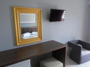 Postel nebo postele na pokoji v ubytování Hotel Pini