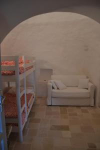 Postel nebo postele na pokoji v ubytování Trullo Piccola Contrada