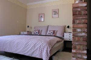 Posteľ alebo postele v izbe v ubytovaní Apartmány u Bašty