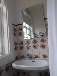 Ванная комната в Residencial Galo D'Ouro