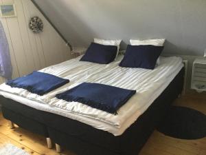 Postel nebo postele na pokoji v ubytování B&B Hannåsa Gård