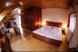 Postel nebo postele na pokoji v ubytování Hotel St.Florian Sturovo