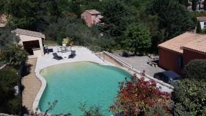 an overhead view of a swimming pool in a backyard at La roque in Figanières +16 photos