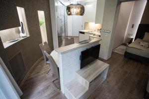 Kuchyňa alebo kuchynka v ubytovaní All Seasons Apartment