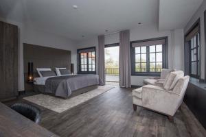 Ένα ή περισσότερα κρεβάτια σε δωμάτιο στο Fletcher Boutique Hotel Duinoord +37 φωτογραφίες