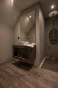 Ένα μπάνιο στο Fletcher Boutique Hotel Duinoord