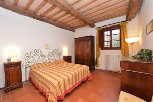 Postel nebo postele na pokoji v ubytování Agriturismo Tenuta Vallelunga