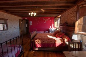 Ein Bett oder Betten in einem Zimmer der Unterkunft La Morada del Cid Burgos