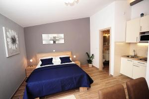 Posteľ alebo postele v izbe v ubytovaní Top Center Zadar Studio Apartments