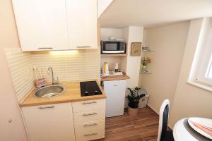 Kuchyňa alebo kuchynka v ubytovaní Top Center Zadar Studio Apartments