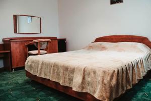 Кровать или кровати в номере Отель Канна
