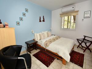 Letto o letti in una camera di Nofesh Ne'eman