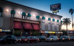 a group of cars parked in front of a building at Olyver Hotel in Los Angeles