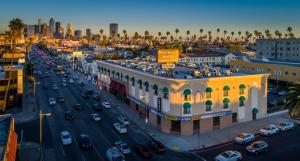 an overhead view of a busy city street with cars at New Seoul Hotel in Los Angeles