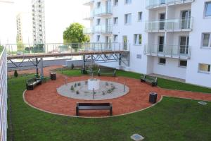Ogród w obiekcie Apartament ORANGE Warmia Towers