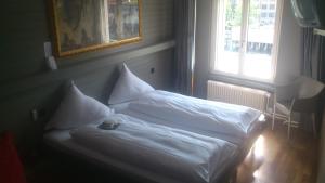 Voodi või voodid majutusasutuse Hotel Limmatblick toas