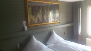 Voodi või voodid majutusasutuse Hotel Limmatblick toas