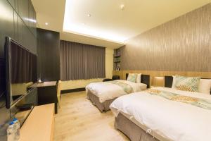 Postel nebo postele na pokoji v ubytování W Hostel