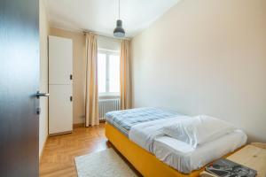 Postel nebo postele na pokoji v ubytování Casa Foscolo