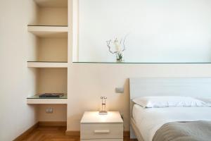 Postel nebo postele na pokoji v ubytování Casa Foscolo