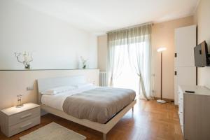Postel nebo postele na pokoji v ubytování Casa Foscolo