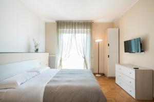 Postel nebo postele na pokoji v ubytování Casa Foscolo