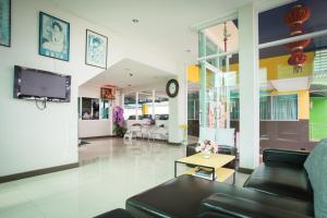 TV a/nebo společenská místnost v ubytování Central Residences