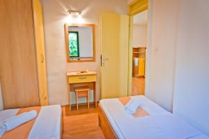 Posteľ alebo postele v izbe v ubytovaní Apartment Bonaca Klek