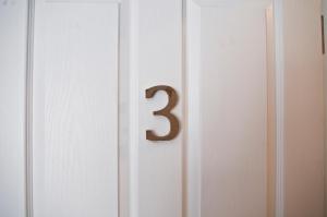 a number on a white door at The Red Lion in Knighton