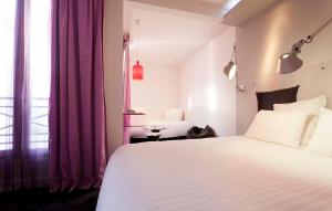 Postel nebo postele na pokoji v ubytování Color Design Hotel