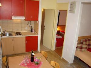 Kuchyňa alebo kuchynka v ubytovaní Apartment Bonaca Klek