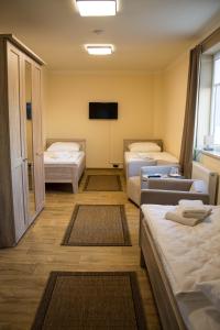 Una cama o camas en una habitación de Haus Vier