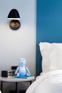 Rúm í herbergi á G2 Hotel Myeongdong