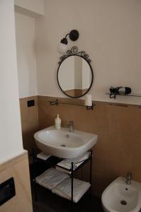 Koupelna v ubytování B&B Le Cicale + 37 fotografií