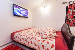 Ένα ή περισσότερα κρεβάτια σε δωμάτιο στο Apartments Milena Zlatibor - Dvorište & Parking