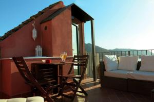 Balkón nebo terasa v ubytování Arias - la suite del Duomo