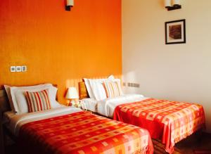 Letto o letti in una camera di The Xanadu, Coonoor
