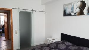 Ein Bett oder Betten in einem Zimmer der Unterkunft Altstadtloft Lüneburg