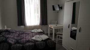 Ein Bett oder Betten in einem Zimmer der Unterkunft Altstadtloft Lüneburg