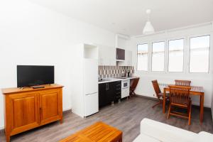 Kuchyň nebo kuchyňský kout v ubytování Apartamentos Florida 30