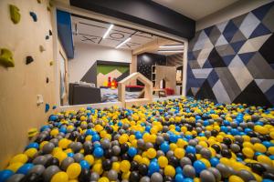 a large room filled with lots of balls at Hotel Zawrat - KROK NA STOK! in Białka Tatrzańska