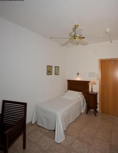 Postel nebo postele na pokoji v ubytování Hotel Grifeu