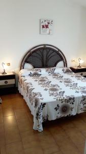 Postel nebo postele na pokoji v ubytování Appartamento Ottiolu Mare