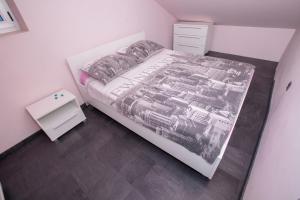 Postel nebo postele na pokoji v ubytování Four Towers Apartments