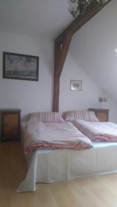 Rúm í herbergi á Apartman Majak Sec