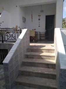 a set of stairs leading to a house at Paleochora Elizabeth Apartments in Palaiochora