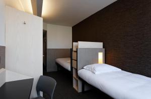 Cama o camas de una habitación en FIAP Paris
