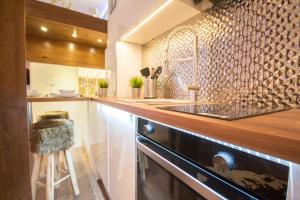 Kuchyňa alebo kuchynka v ubytovaní Gold Apartman