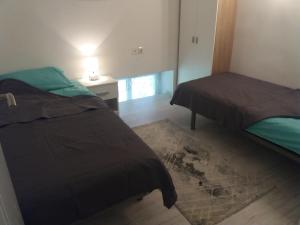 Ein Bett oder Betten in einem Zimmer der Unterkunft Apartment Osk